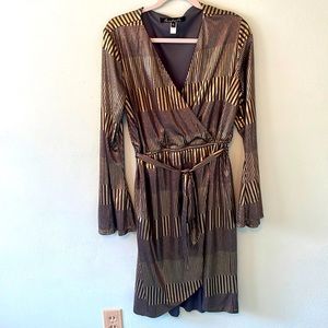 Black and gold shimmer wrap dress